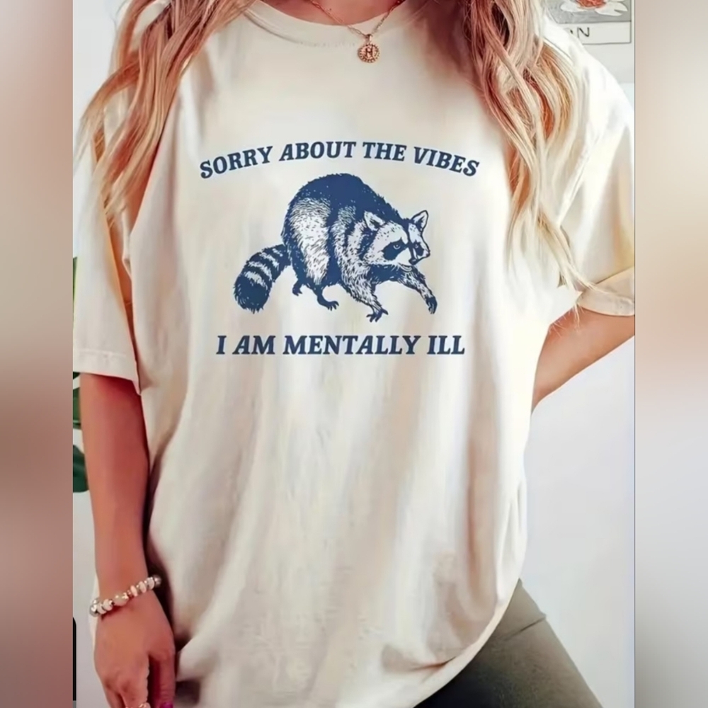 Graphic Tee with Raccoon "Sorry About The Vibes"
